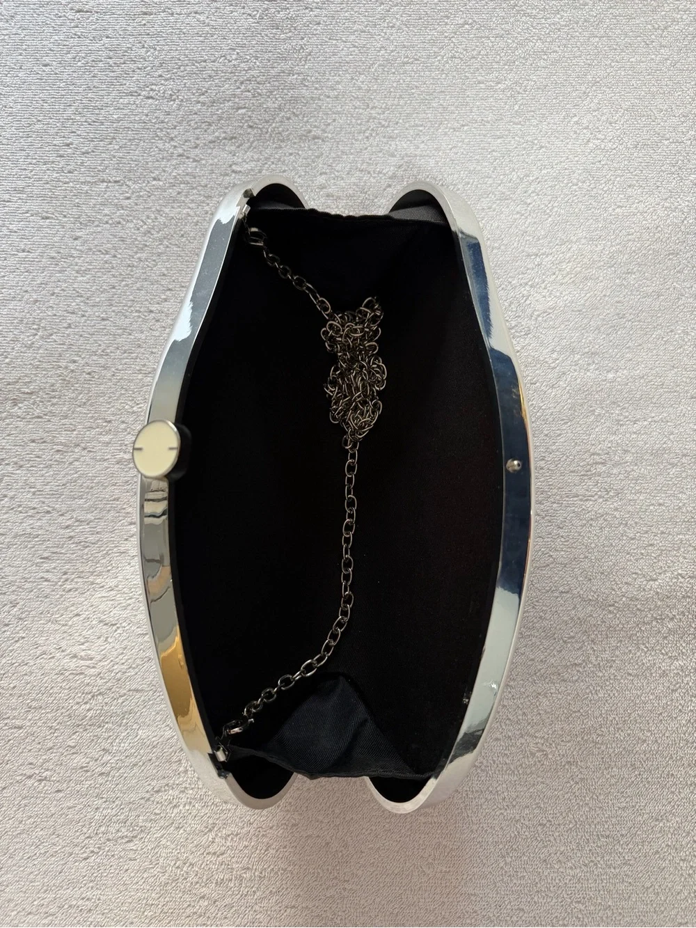 Fashion Nova Silver Metallic Sculpted Clutch